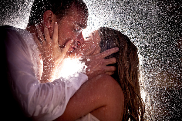 http://junebugweddings.com/img/photobug/june2010/romantic-backlit-photo-couple-kissing-passionately-in-rain-wedding-photo-by-south-africa-photographer-yvette-gilbert.jpg