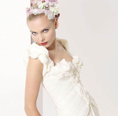 wedding dresses, veils, headpieces and wraps by Rosa Clara, Christian Lacroix and Jesus Del Pozo
