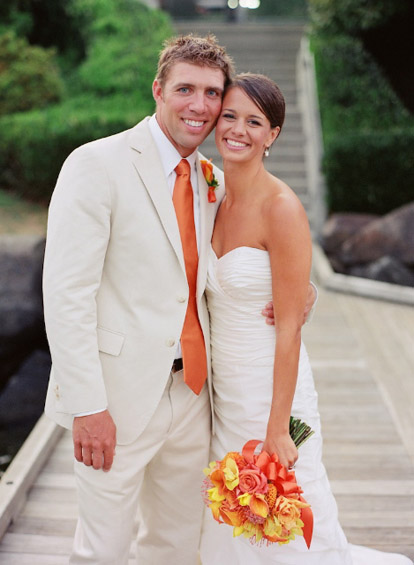 Summer outdoor wedding with a navy blue, orange, yellow and white color palette, images by One Thousand Words Photography