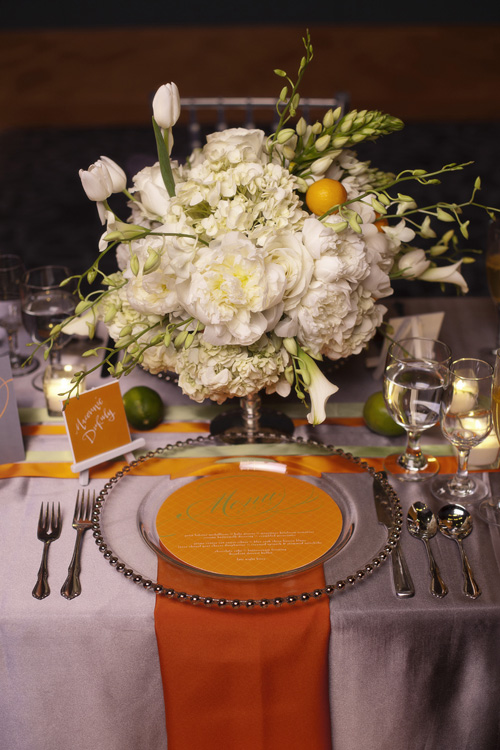 citrus orange and green wedding decor ideas and inspiration from Urbane Montage Events and Cadence Cornelius Photographs |via junebugweddings.com