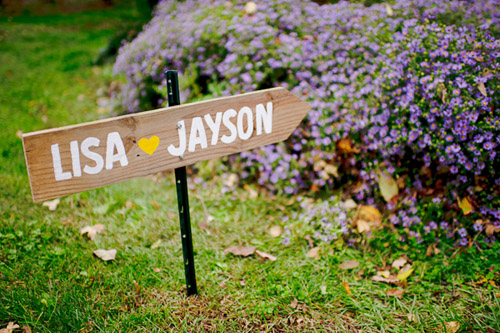 Rustic wedding sign of reclaimed wood. Photo by Emily Porter Photography