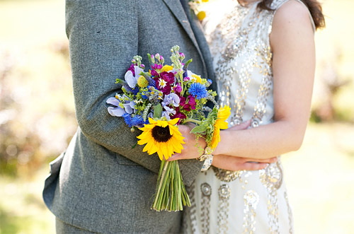 English garden inspired flowers with Jenny Packham gown; photos by Dominique Bader | Junebug Weddings