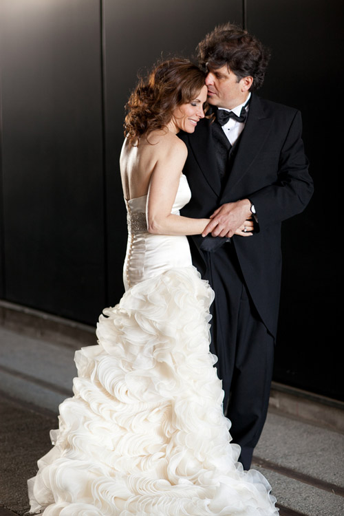 bright black, white, orange and yellow modern NYC loft wedding, photos by Image Singuliere via JunebugWeddings.com