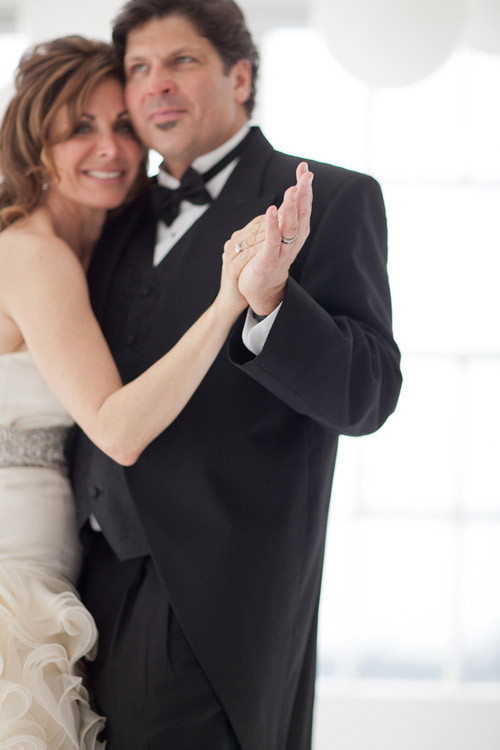 bright black, white, orange and yellow modern NYC loft wedding, photos by Image Singuliere via JunebugWeddings.com