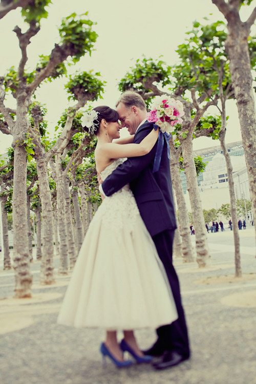 Pretty San Francisco wedding at City Hall romantic portrait of bride and groom, photo by Paco and Betty