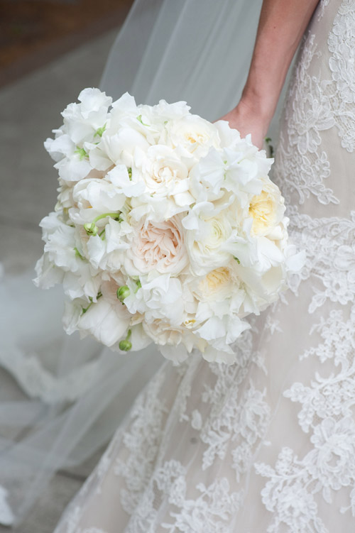 Bride's white floral bouquet at southern garden wedding at First Baptist church in Charleston, South Carolina, photography by Leigh Webber