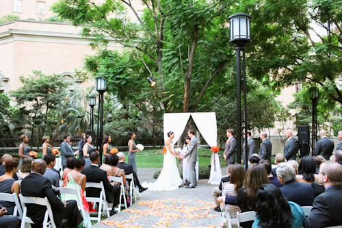 Elegant white, grey, and orange wedding; photos by Adrienne Gunde Photography | junebugweddings.com