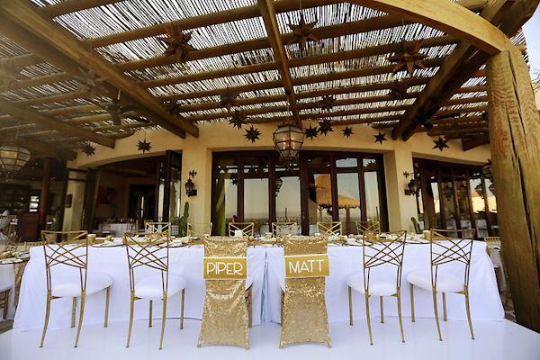 gold and white wedding and rehearsal dinner at Capella Pedregal Resort in Cabo San Lucas, photos by Chris Plus Lynn | via junebugweddings.com