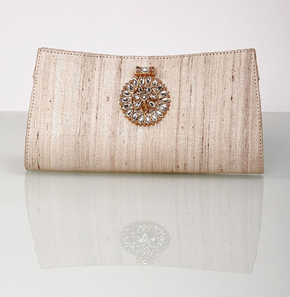 ivory raw silk wedding clutch by Lukab and Motwani