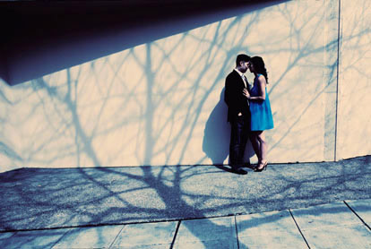 Engagement portrait with dramatic tree shadows by John and Joseph Photography