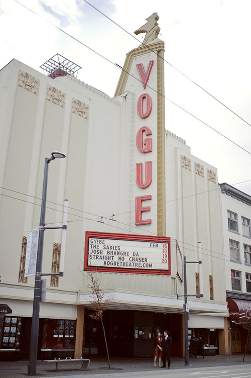 creative engagement photos at the Vogue Theatre in Vancouver, BC by Nordica Photography