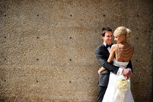 elegant Chicago wedding at Trump Tower, stylish wedding dress and bridal necklace, classic black tuxedo, wedding photos by Nakai Photography 