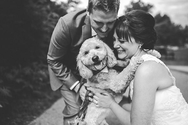 photo of bride and groom with dog at wedding by Jennifer Moher Photography | via junebugweddings.com