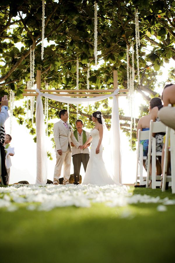 pink destination wedding in Hawaii at St Regis Princeville Resort, photos by Dmitri and Sandra Photography | via junebugweddings.com