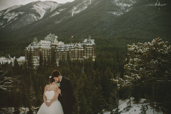 white and gold winter wedding at Fairmont Banff Springs, photo by Gabe McClintock | via junebugweddings.com