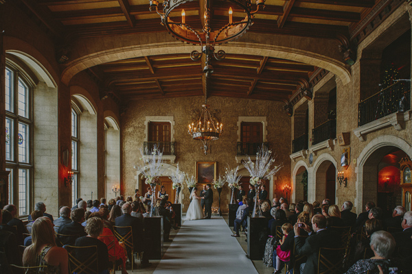 white and gold winter wedding at Fairmont Banff Springs, photo by Gabe McClintock | via junebugweddings.com