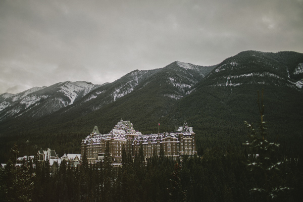 white and gold winter wedding at Fairmont Banff Springs, photo by Gabe McClintock | via junebugweddings.com