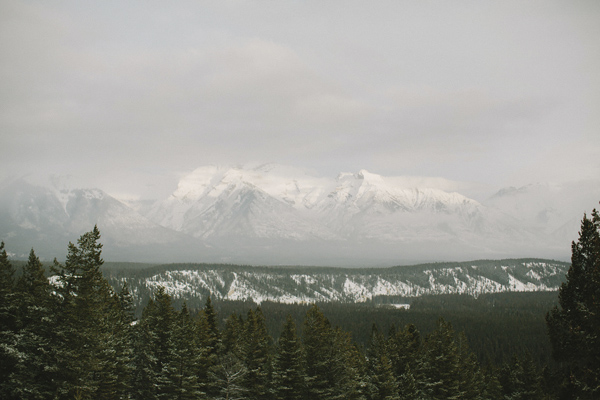 white and gold winter wedding at Fairmont Banff Springs, photo by Gabe McClintock | via junebugweddings.com