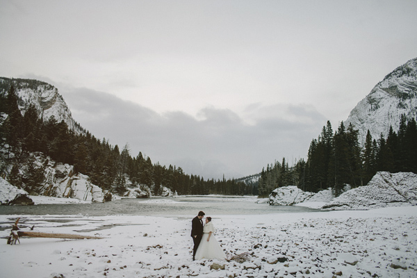 white and gold winter wedding at Fairmont Banff Springs, photo by Gabe McClintock | via junebugweddings.com