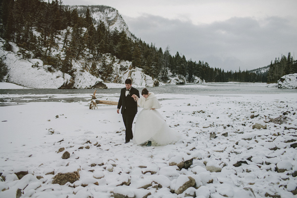 white and gold winter wedding at Fairmont Banff Springs, photo by Gabe McClintock | via junebugweddings.com