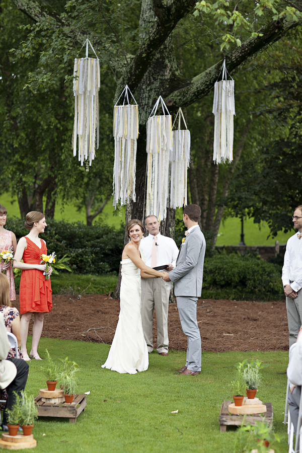 bright yellow and orange summer wedding in Atlanta, photo by Paperlily Photography | via junebugweddings.com