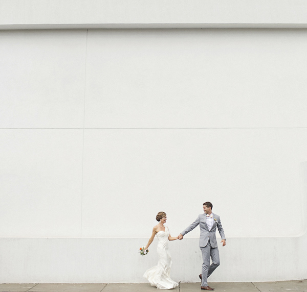 bright yellow and orange summer wedding in Atlanta, photo by Paperlily Photography | via junebugweddings.com