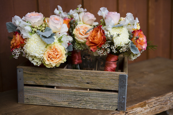 peach, coral, grey wedding at Swiftwater Cellars, photo by La Vie Photography | via junebugweddings.com