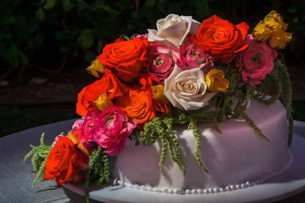 colorful floral wedding cake, photo by Zasil Studio | via junebugweddings.com