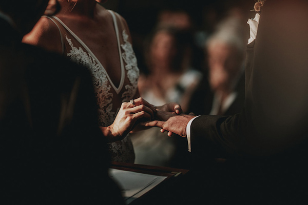 exchange of the rings, photo by Bradford Martens | via junebugweddings.com