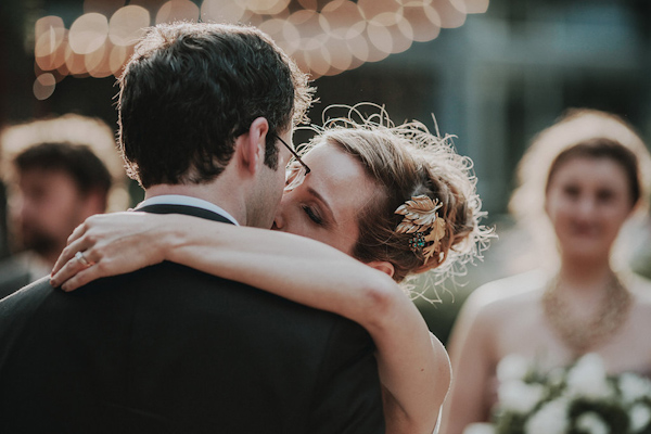 first kiss, photo by Bradford Martens | via junebugweddings.com