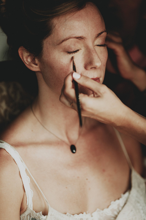 bride getting ready, photo by Bradford Martens | via junebugweddings.com