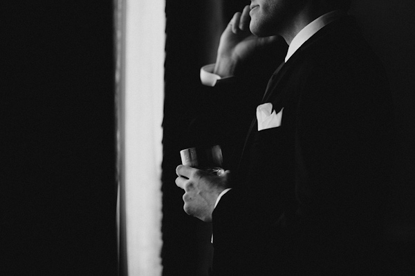 groom getting ready, photo by Bradford Martens | via junebugweddings.com