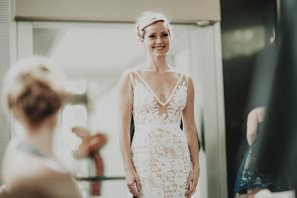 bride getting ready, photo by Bradford Martens | via junebugweddings.com