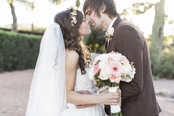 bride and groom first kiss, photo by Rachel Solomon | via junebugweddings.com