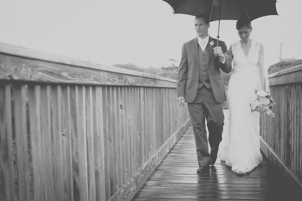 wedding portrait in the rain, photo by Still55 Photography | via junebugweddings.com