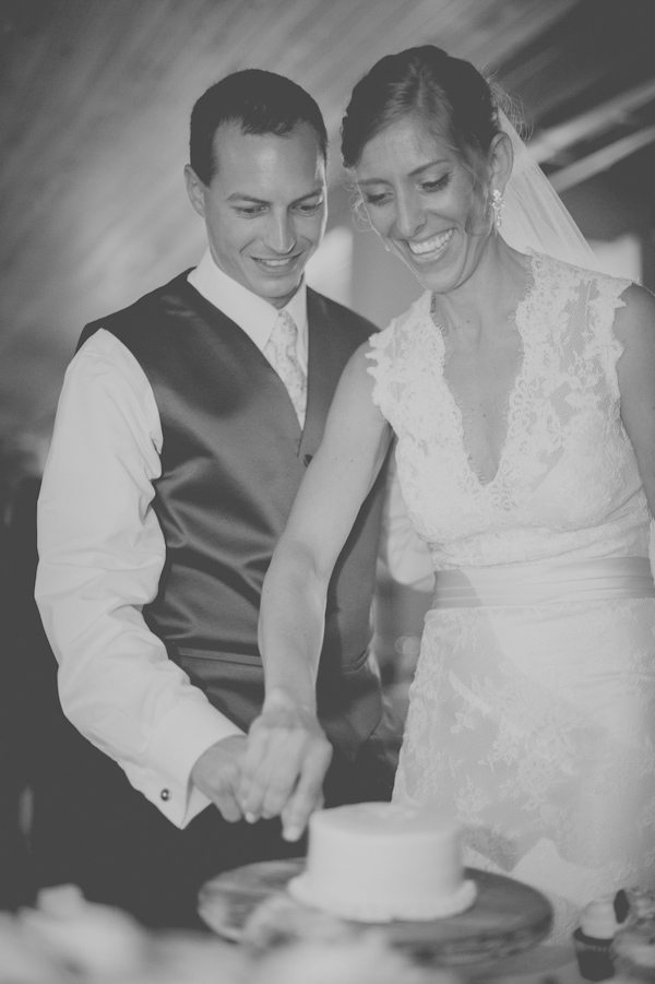 cutting the cake, photo by Still55 Photography | via junebugweddings.com