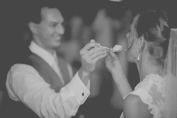 cutting the cake, photo by Still55 Photography | via junebugweddings.com