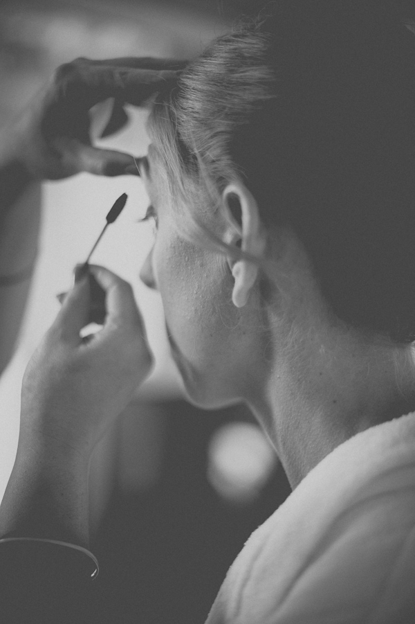 bride getting ready, photo by Still55 Photography | via junebugweddings.com