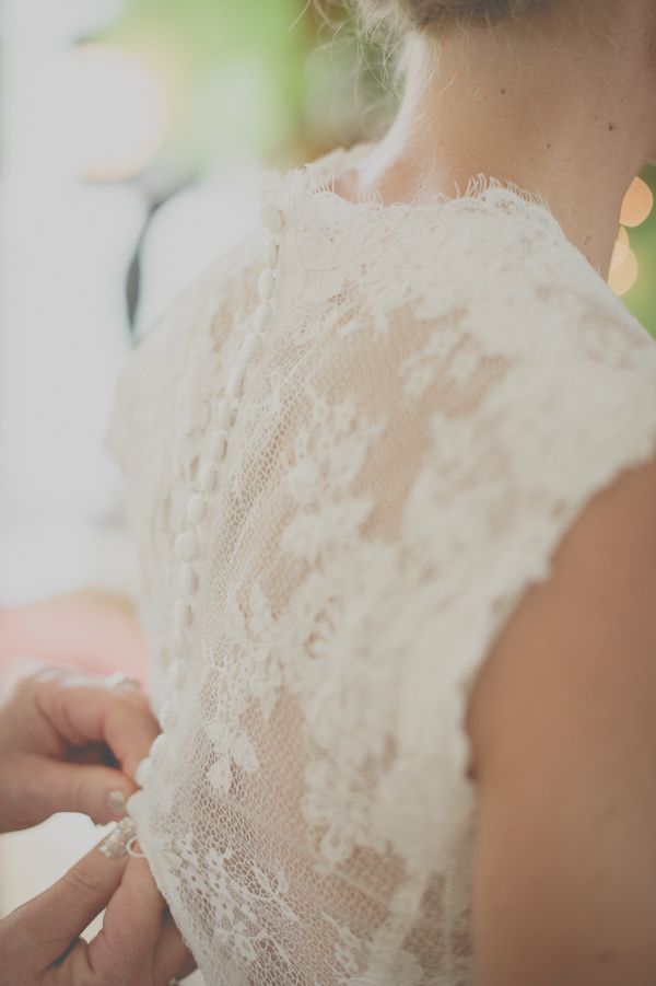 lace wedding dress by Allure Bridals, photo by Still55 Photography | via junebugweddings.com