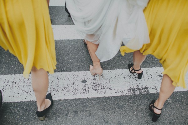 bride and bridesmaids' shoes in the city