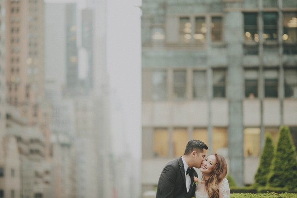 adorable kiss on the cheek couple's portrait