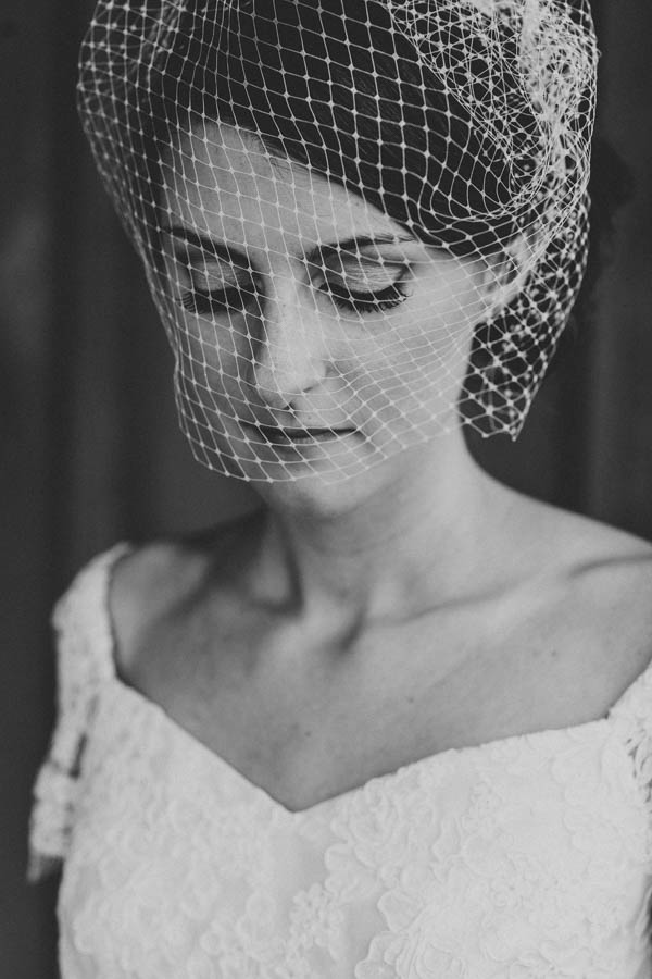 elegant DIY wedding bridal portrait with birdcage veil, photo by Storytellers & Co. | via junebugweddings.com