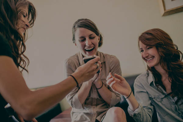 bride and bridesmaids getting ready, photo by Storytellers & Co. | via junebugweddings.com