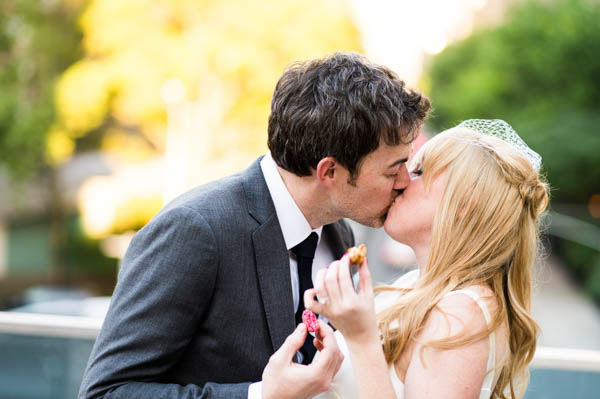 sweet couple's kiss wedding portrait