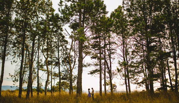 same-sex couple's portrait with beautiful natural landscape