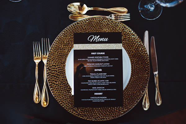 black and gold place setting