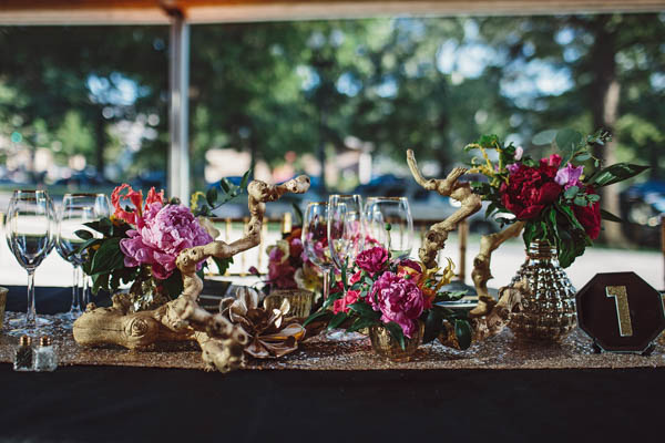 sequin table runner and vibrant floral decor