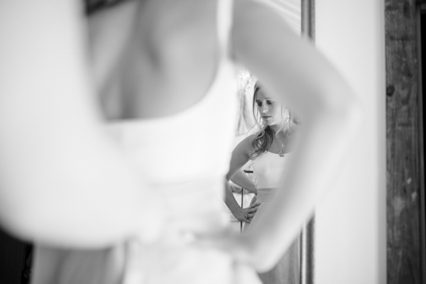 bride getting ready, photo by Chowen Photography | via junebugweddings.com