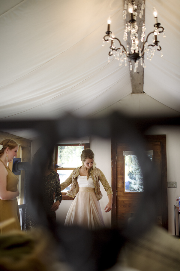 bride getting ready, photo by Chowen Photography | via junebugweddings.com