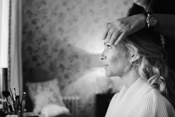 bride getting ready, photo by Sansom Photography | via junebugweddings.com